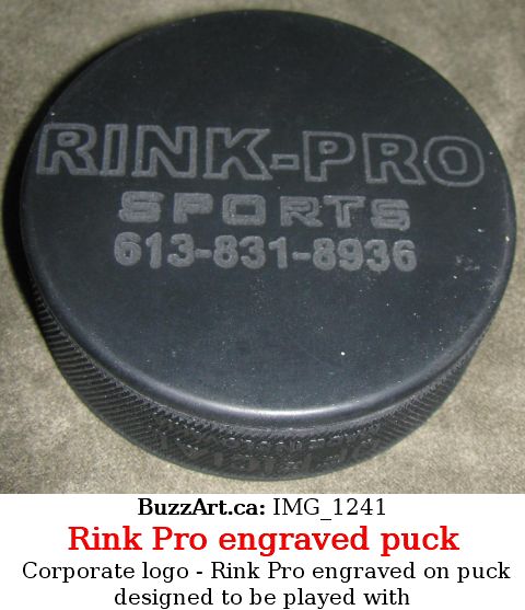 Company logo Rink-Pro engraved on hockey puck